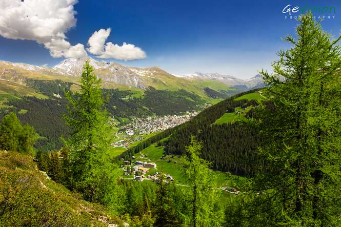 View to Davos city and Swiss Alps fron the top of the Rinerhorn